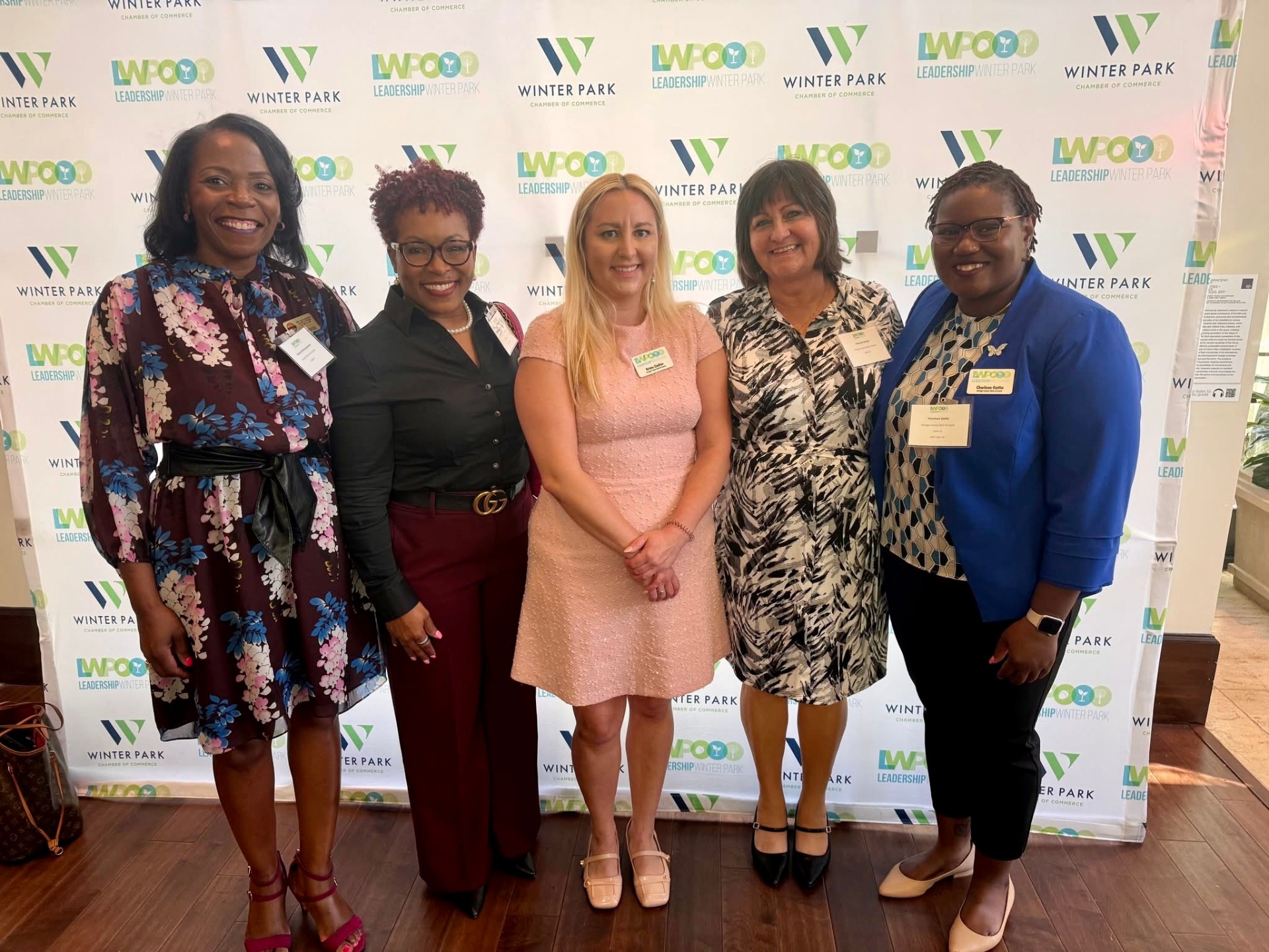 Roberta Walton Johnson with four fellow leaders at a Leadership Winter Park Chamber of Commerce event.